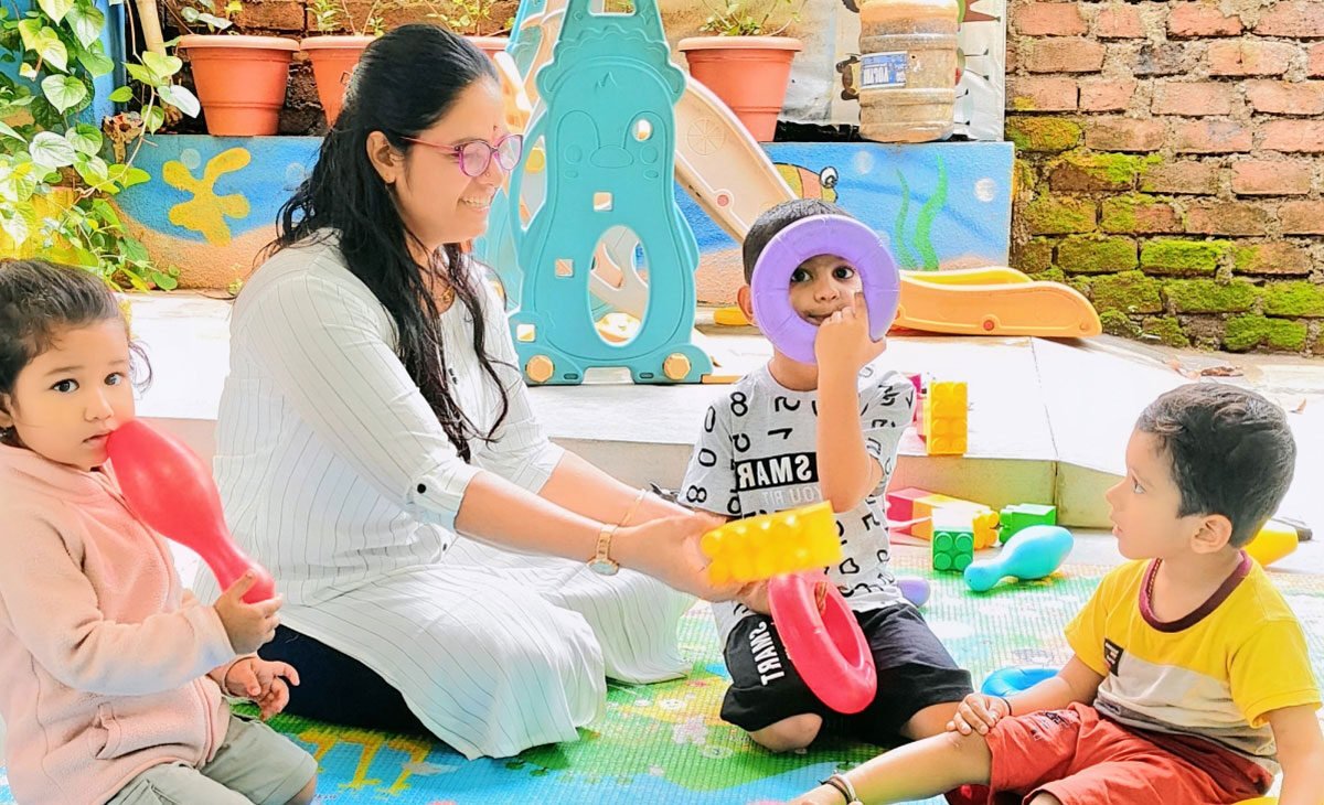 Kids sharing smiles during creative activities at Utkarsha Day Care, Pune